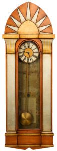Art Deco Case Clock with Sun Burst crest in copper and gold.