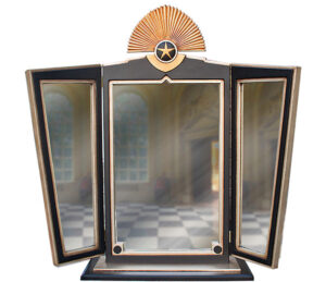 An art deco dressing table mirror, with black frame and rectangular design.