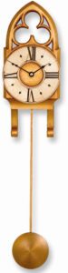 Small Gothic Pendulum Clock with trefoil pediment in gold and silver.