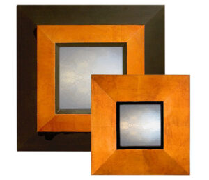 light copper reverse profile mirror, showing rectangular mirror with copper frame and light finish,.